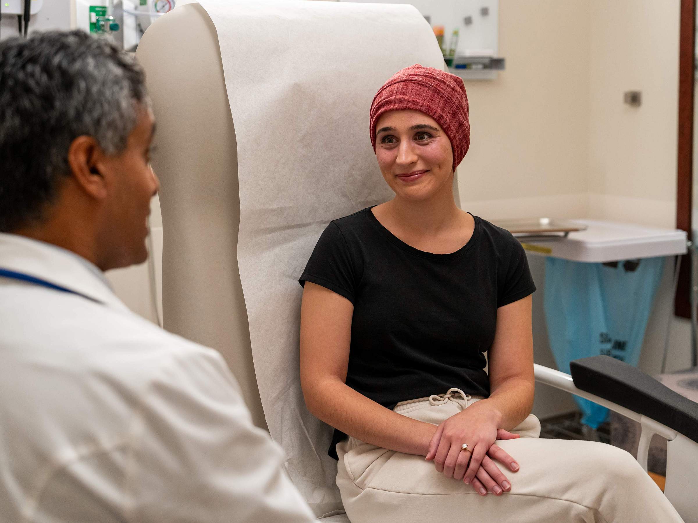 Nurse holding hands with patient
