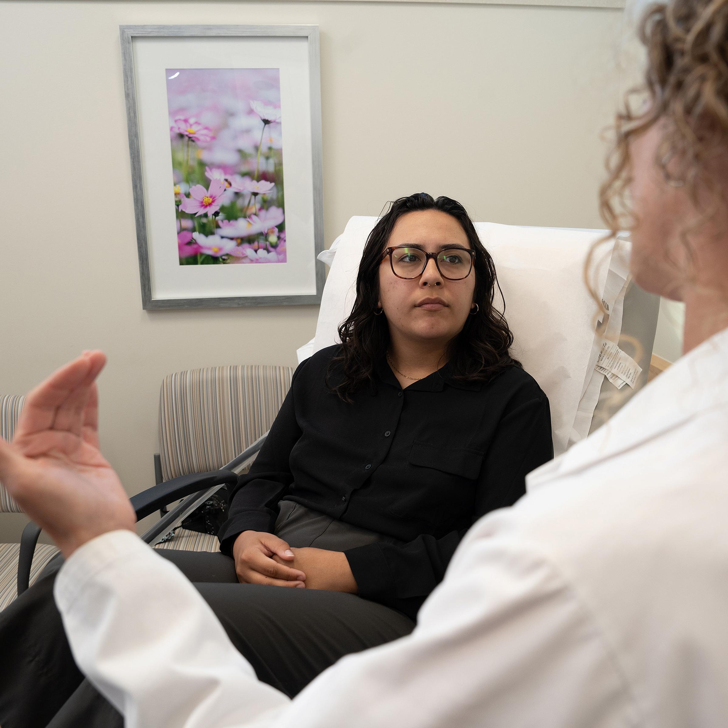 Postpartum patient speaking with Jolyn Hill, MD