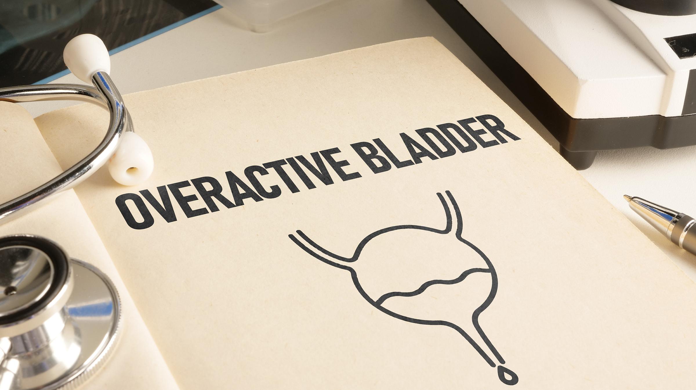 Book with text "overactive bladder" and stethoscope on it